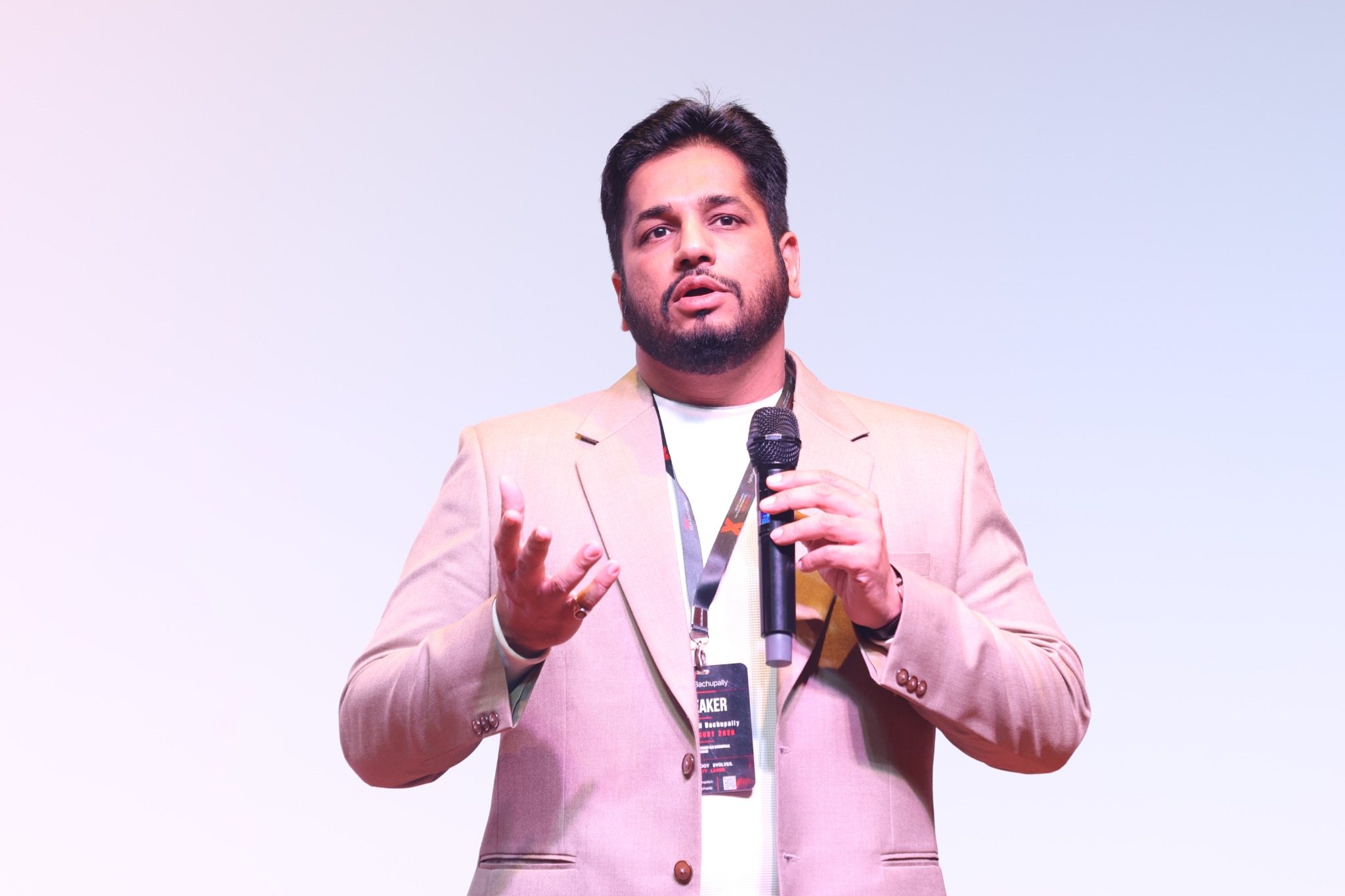 TEDx speaker on stage